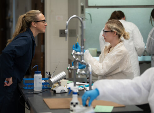 Biology, Biotechnology, and Health Science student and professor in a New England College Biology Lab