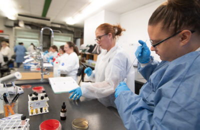 Biology, Biotechnology, and Health Science students in a New England College Biology Lab