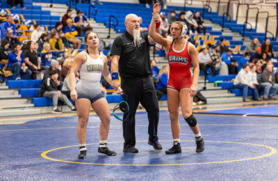 Jaclyn Dehney of New England College earns all-American honors at National Collegiate Women’s Wrestling Championships nationals in March 2025.